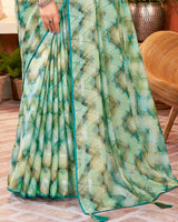 Vishal Prints Aqua Green Digital Print Fancy Brasso Saree With Core Piping And Tassel