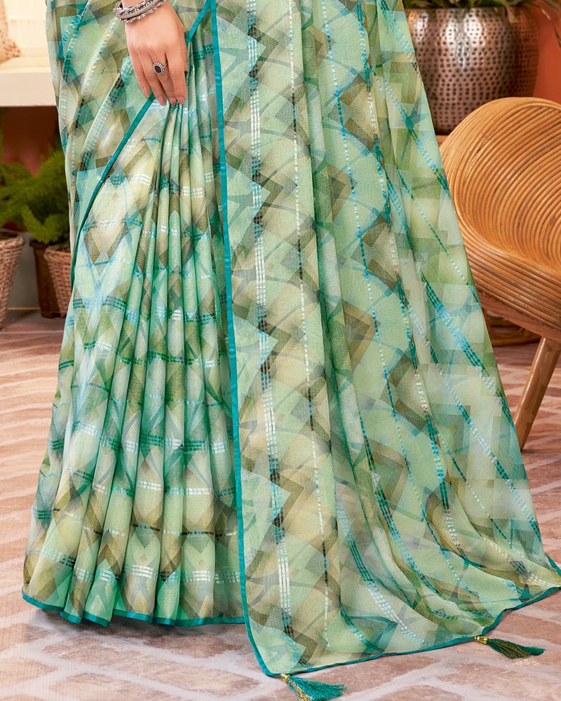 Vishal Prints Aqua Green Digital Print Fancy Brasso Saree With Core Piping And Tassel