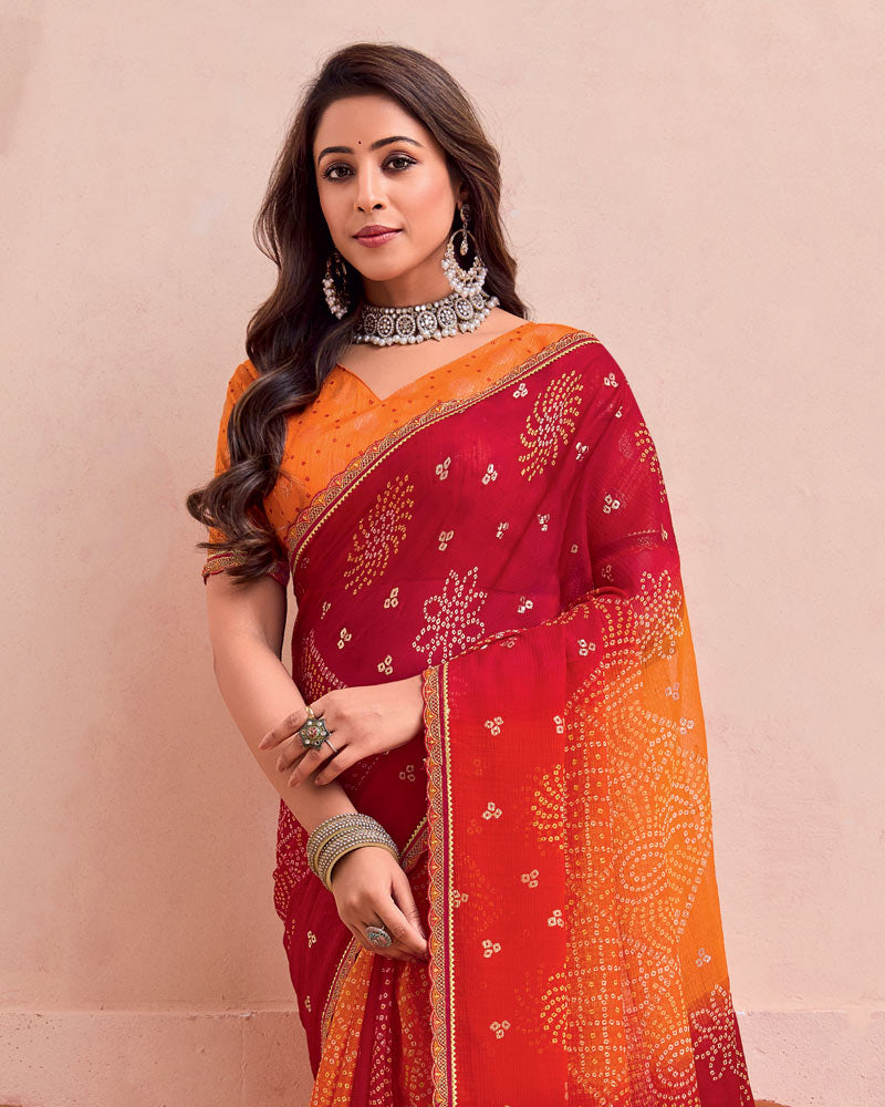 Vishal Prints Flame Orange And Crimson Red Printed Chiffon Traditional Print Saree With Foil Print And Cut Work Border
