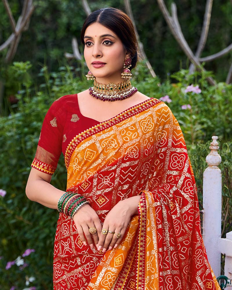 Vishal Prints Crimson Red And Bright Orange Printed Chiffon Traditional Print Saree With Foil Print And Fancy Border