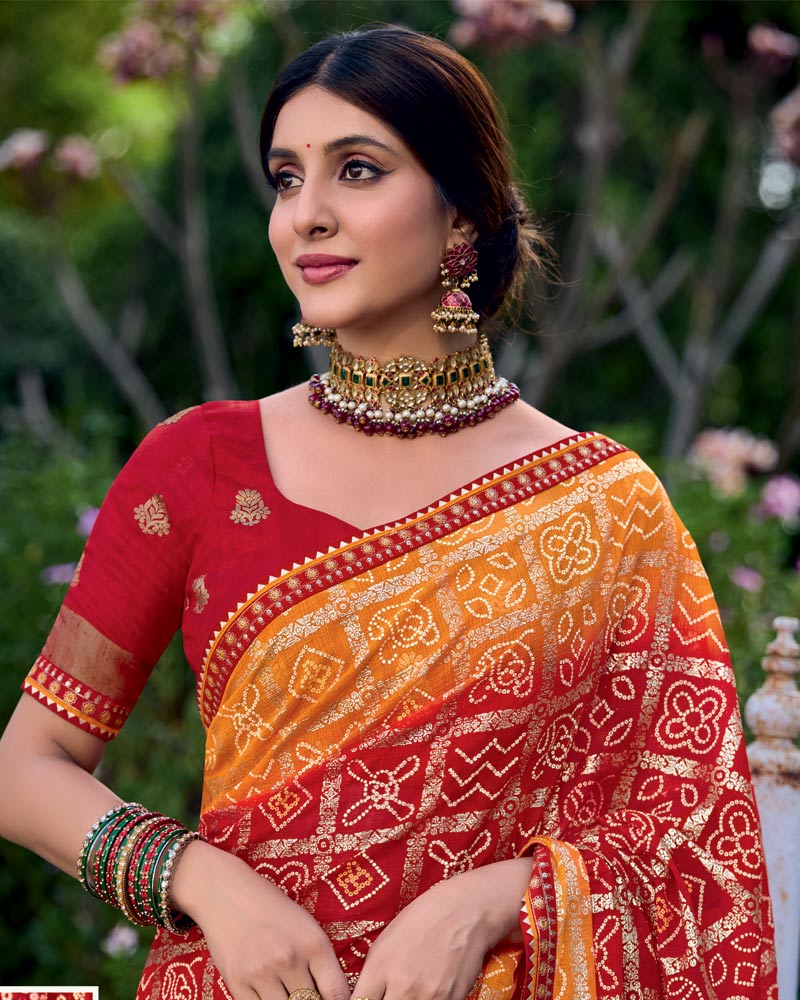 Vishal Prints Crimson Red And Bright Orange Printed Chiffon Traditional Print Saree With Foil Print And Fancy Border