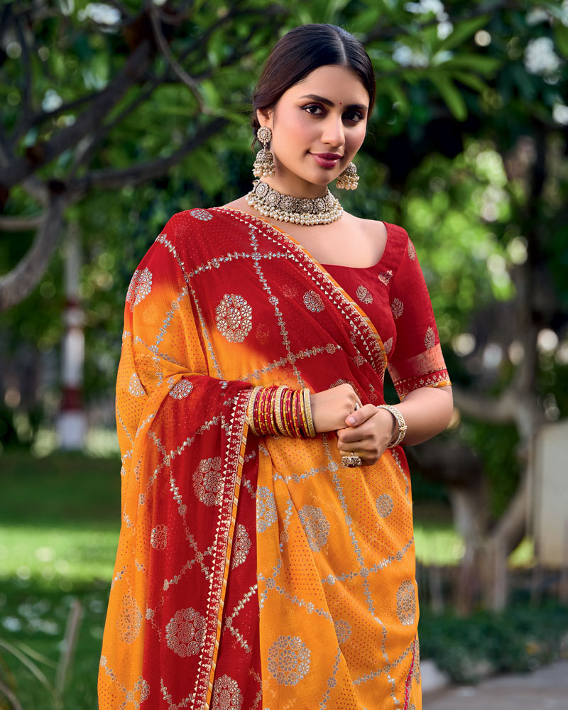 Vishal Prints Pumpkin Orange And Milano Red Printed Chiffon Traditional Print Saree With Foil Print And Fancy Border