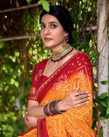 Vishal Prints Dark Orange And Scarlet Red Printed Chiffon Traditional Print Saree With Foil Print And Fancy Border