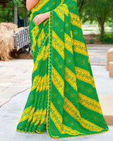 Vishal Prints Forest Green And Dark Yellow Fancy Chiffon Traditional Print Saree With Foil Print And Cut Work Border