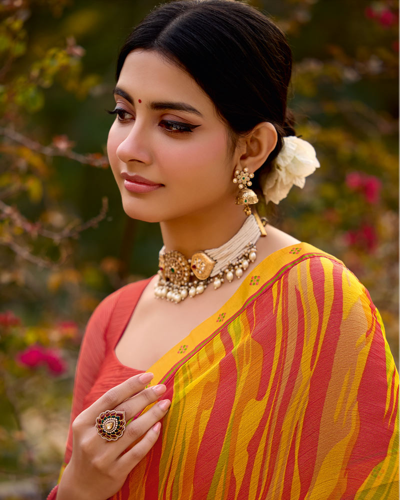 Vishal Prints Yellow Orange Printed Brasso Saree With Fancy Border