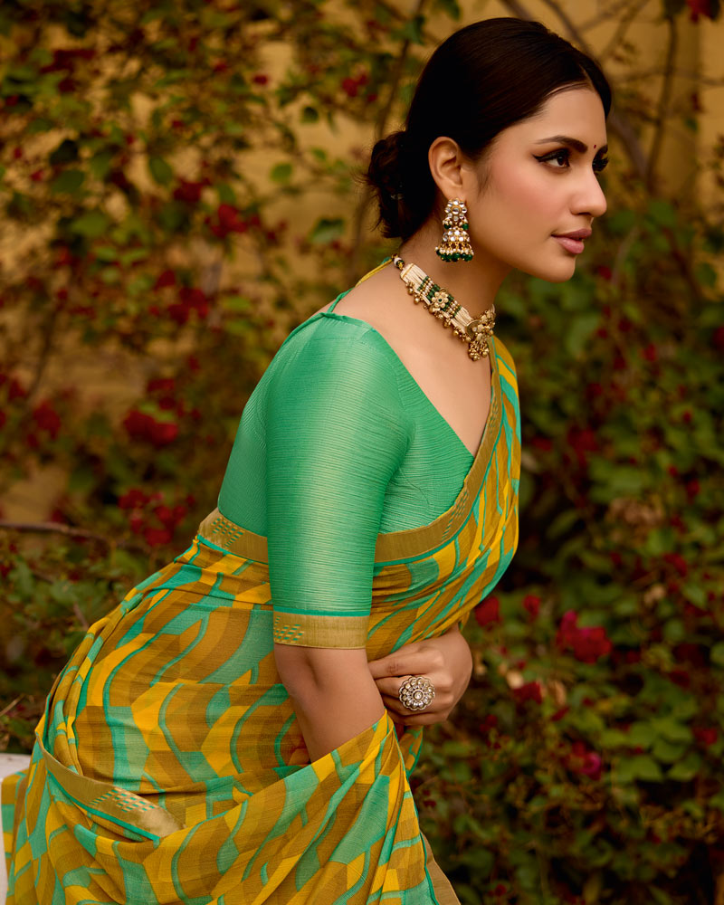 Vishal Prints Mustard Printed Brasso Saree With Fancy Border