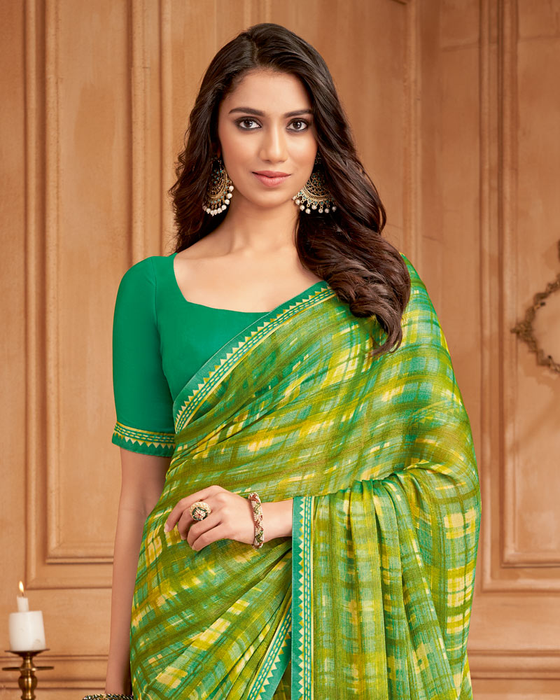 Vishal Prints Dark Olive Green Printed Brasso Saree With Fancy Border