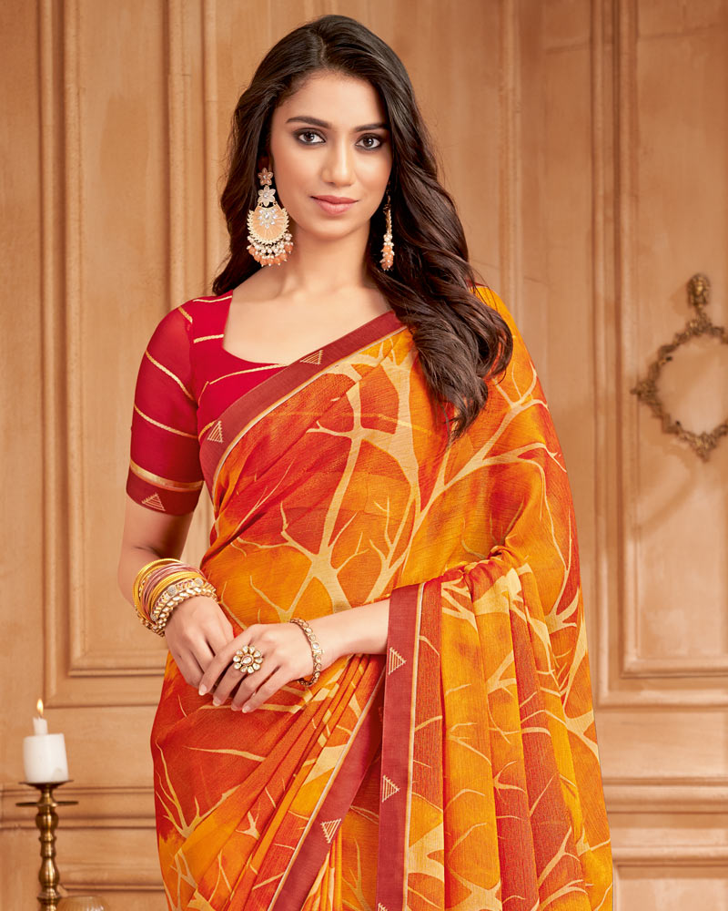 Vishal Prints Carrot Orange Printed Brasso Saree With Fancy Border