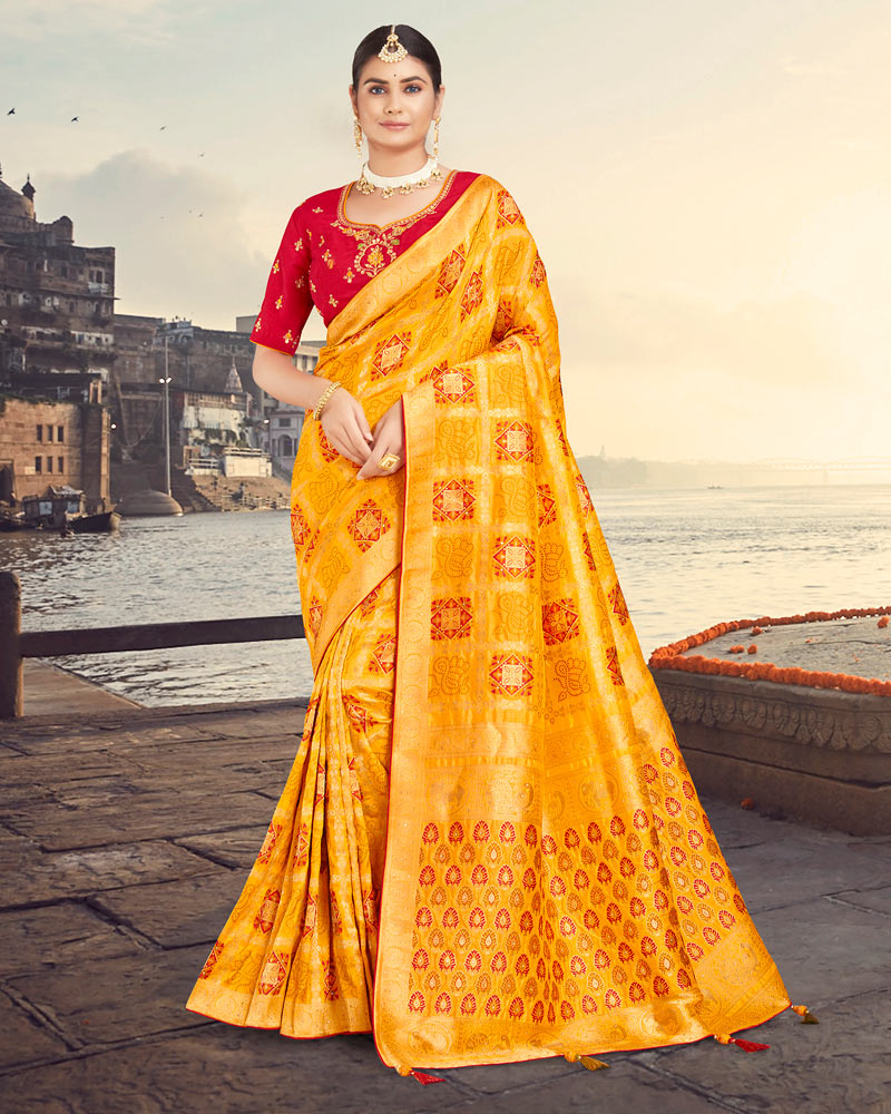 Vishal Prints Orange Silk Weaving Saree With Zari Border And Tassel