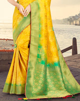 Vishal Prints Yellow Silk Weaving Saree With Zari Border And Tassel