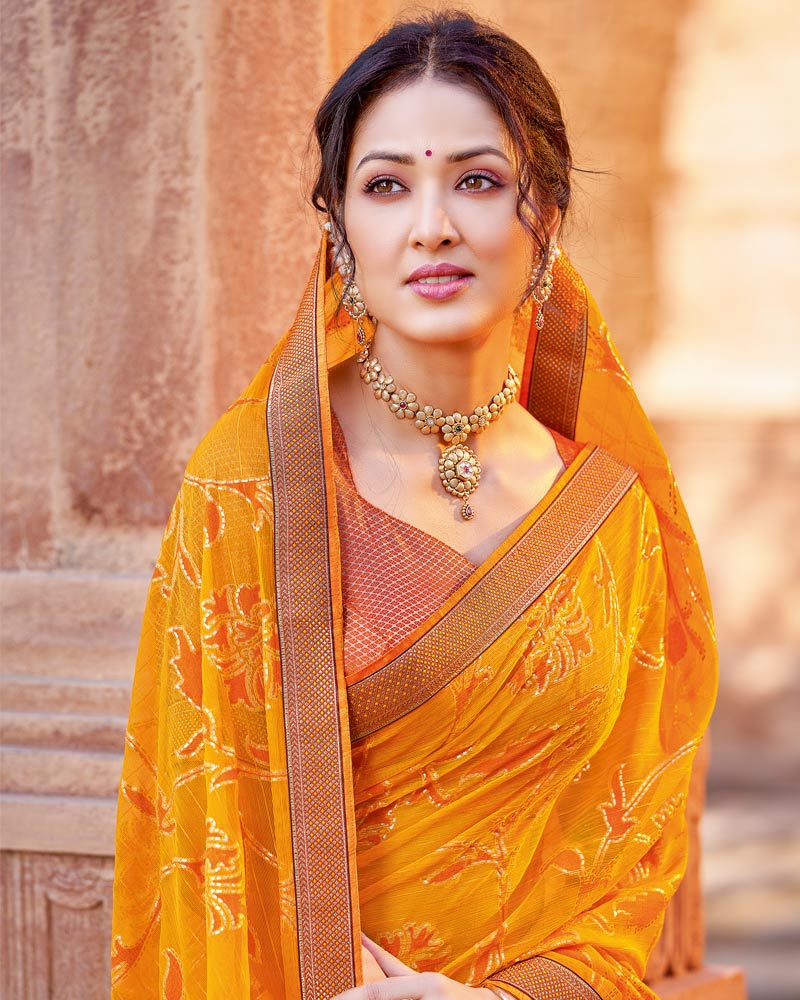 Vishal Prints Dark Orange Chiffon Patterned Saree With Foil Print And Fancy Lace Border