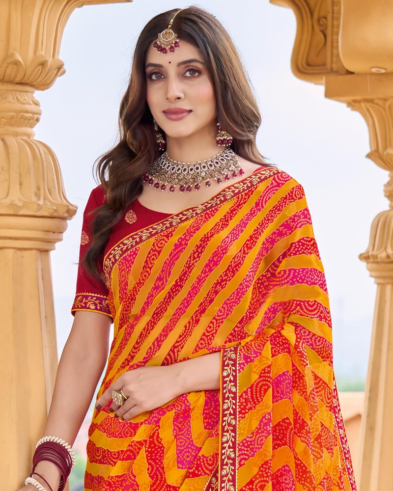 Vishal Prints Pumpkin Orange Printed Chiffon-Brasso Saree With Fancy Border