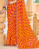 Vishal Prints Pumpkin Orange Printed Chiffon-Brasso Saree With Fancy Border