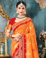 Vishal Prints Orange Dola Silk Weaving Work Saree With Border And Tassel