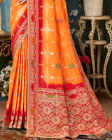 Vishal Prints Orange Dola Silk Weaving Work Saree With Border And Tassel