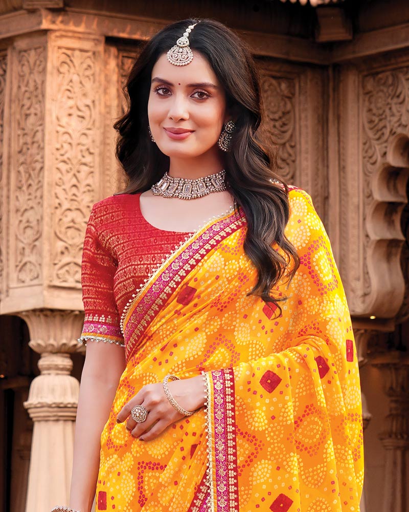 Vishal Prints Deep Yellow Designer Georgette Traditional Print Saree With Foil Print And Fancy Border