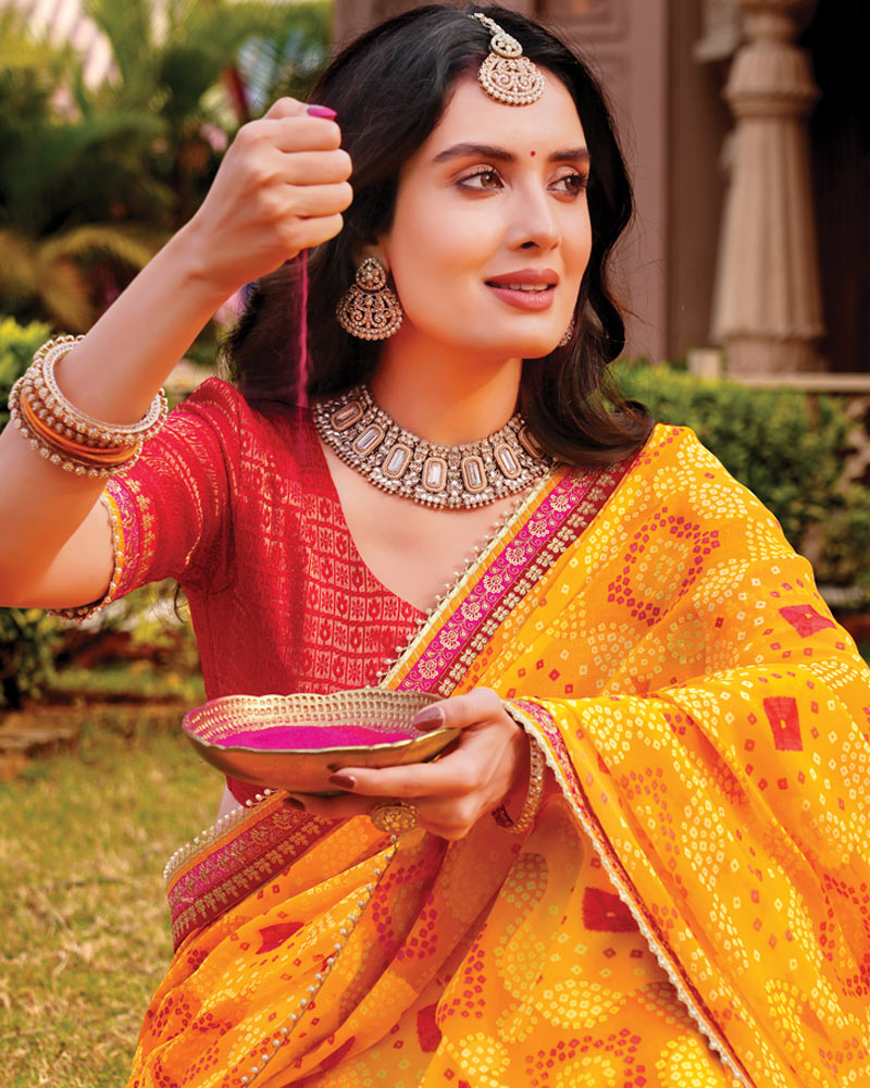 Vishal Prints Deep Yellow Designer Georgette Traditional Print Saree With Foil Print And Fancy Border
