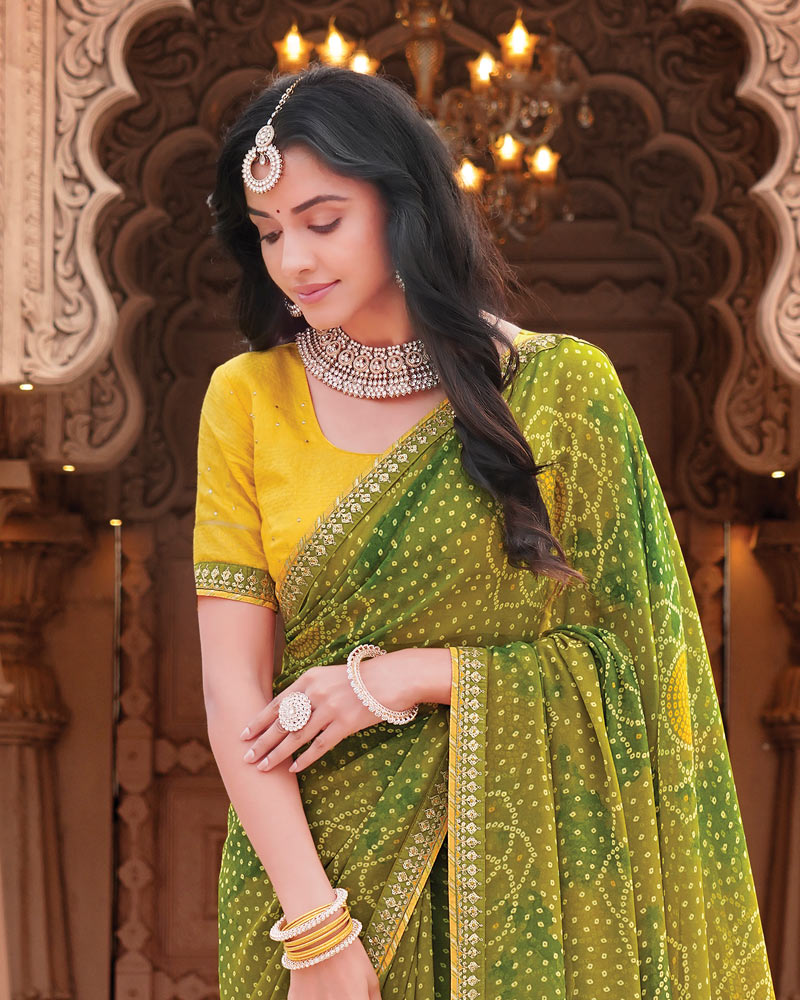 Vishal Prints Mehandi Green Designer Georgette Traditional Print Saree With Foil Print And Fancy Border