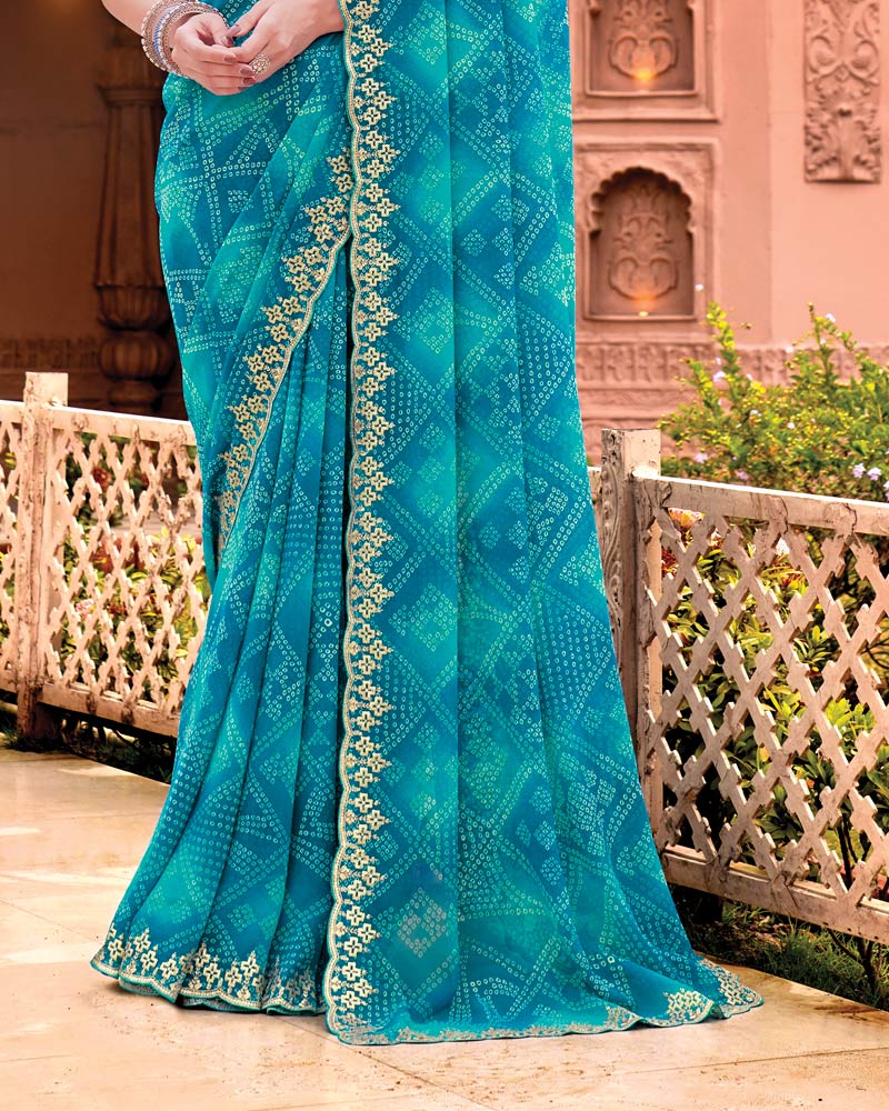Vishal Prints Deep Sky Blue Designer Georgette Traditional Print Saree With Foil Print And Cut Work Embroidery Border