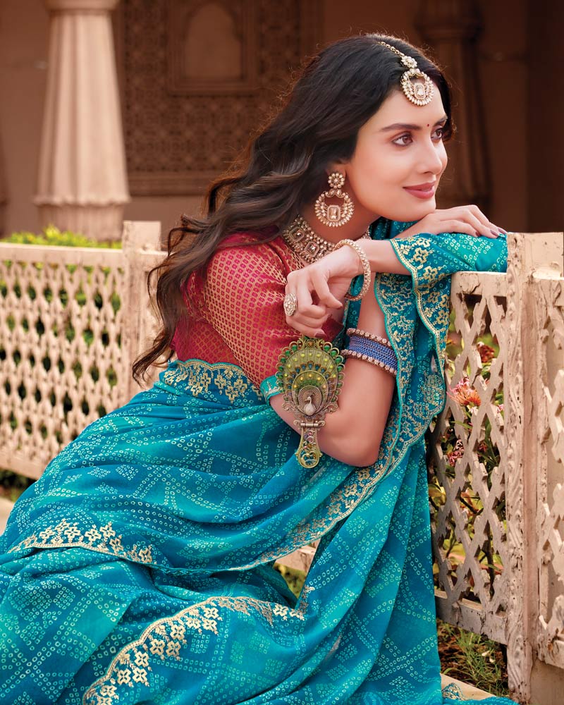 Vishal Prints Deep Sky Blue Designer Georgette Traditional Print Saree With Foil Print And Cut Work Embroidery Border