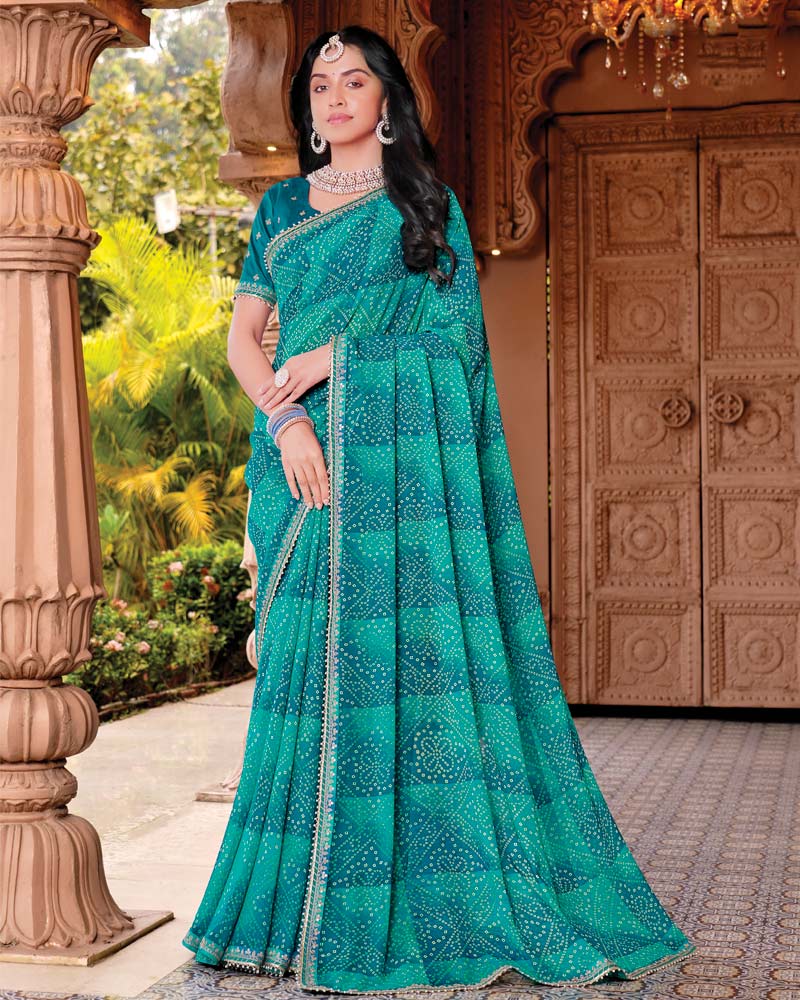 Vishal Prints Deep Teal Blue Designer Georgette Traditional Print Saree With Foil Print And Fancy Embroidery Border