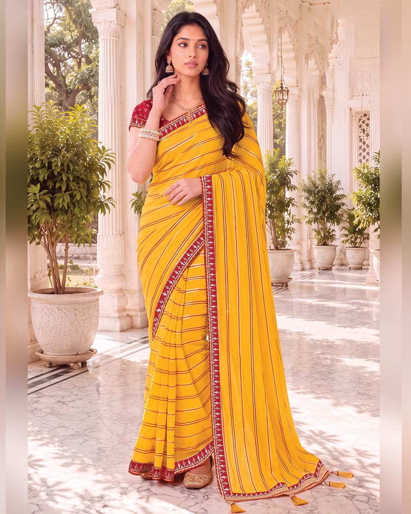 Vishal Prints Bright Yellow Georgette Saree With Foil Print And Fancy Embroidery Border With Tassel