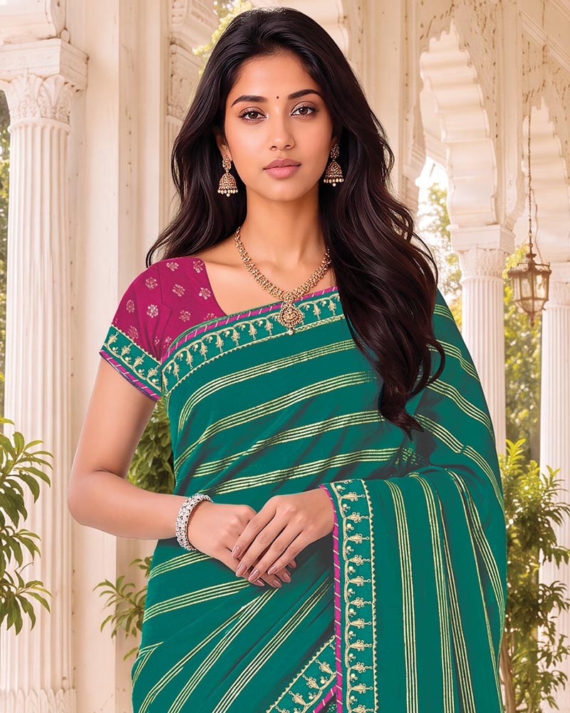 Vishal Prints Teal Green Georgette Saree With Foil Print And Fancy Embroidery Border With Tassel