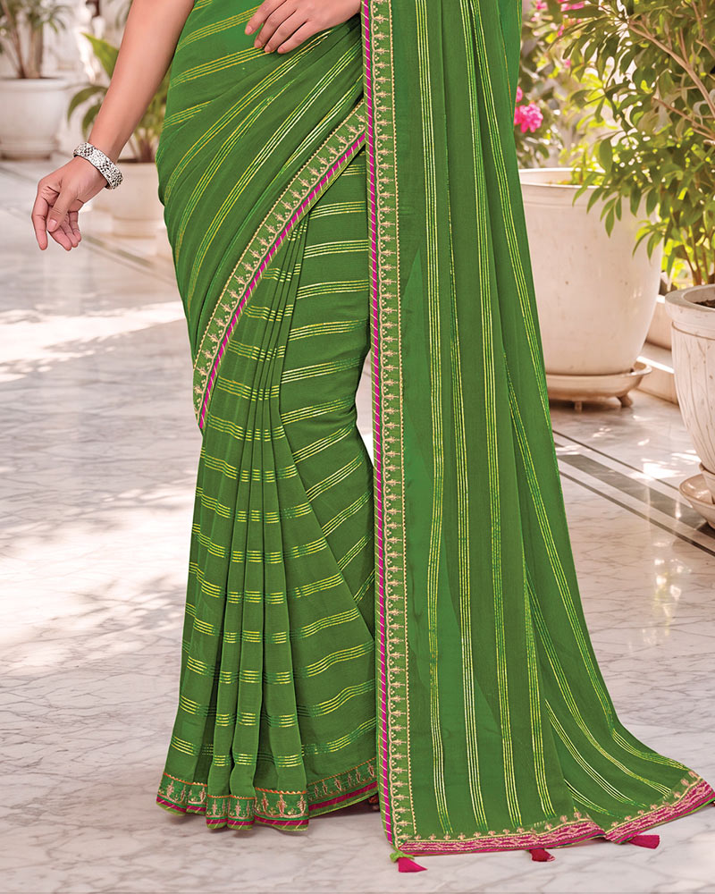 Vishal Prints Parrot Green Georgette Saree With Foil Print And Fancy Embroidery Border With Tassel
