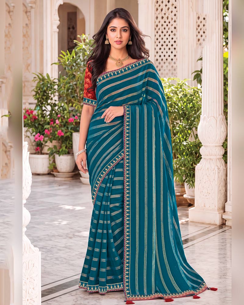 Vishal Prints Navy Blue Georgette Saree With Foil Print And Fancy Embroidery Border With Tassel