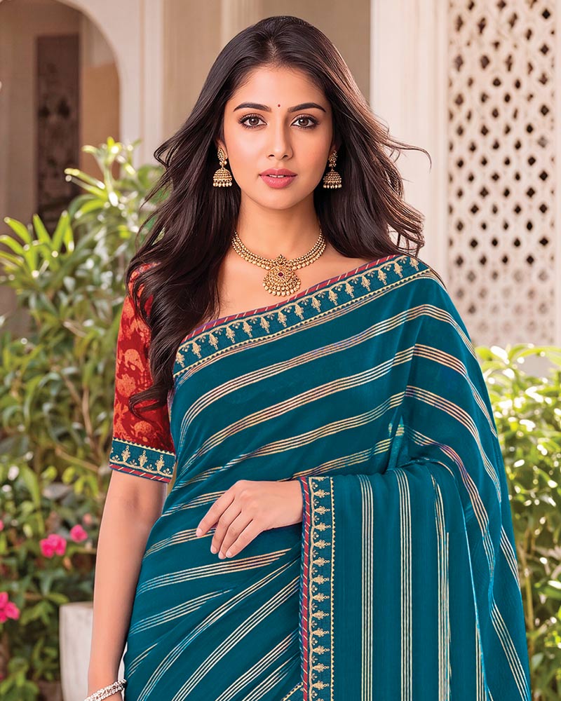 Vishal Prints Navy Blue Georgette Saree With Foil Print And Fancy Embroidery Border With Tassel