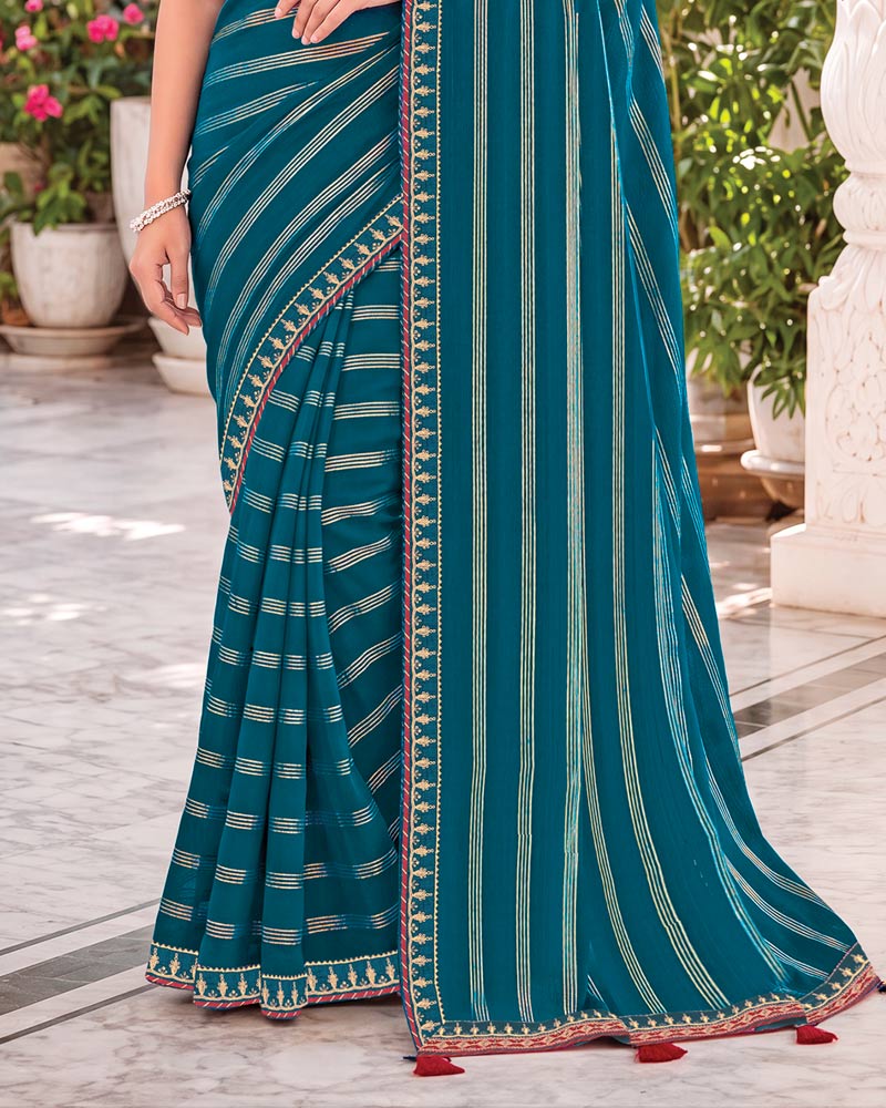 Vishal Prints Navy Blue Georgette Saree With Foil Print And Fancy Embroidery Border With Tassel