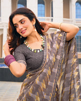 Vishal Prints Charcoal Grey And Tan Printed Fancy Chiffon Saree With Fancy Border
