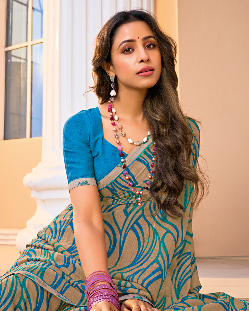 Vishal Prints Sandy Beige And Teal Printed Fancy Chiffon Saree With Fancy Border