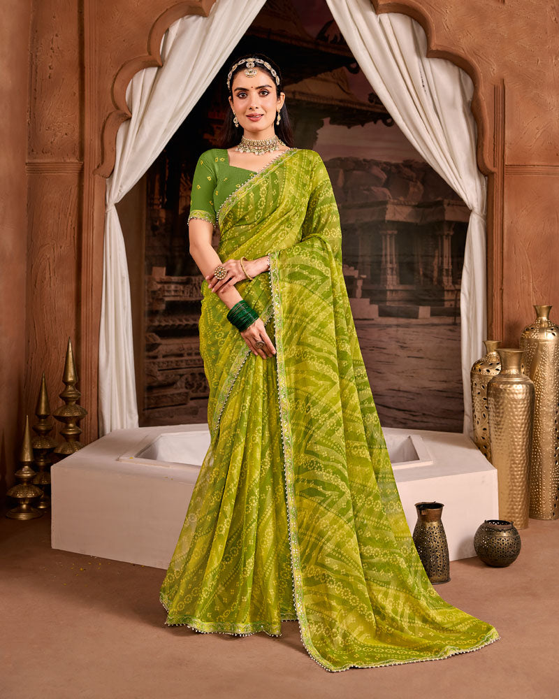 Vishal Prints Mehandi Green Traditional Print Brasso Saree With Fancy Embroidery Border