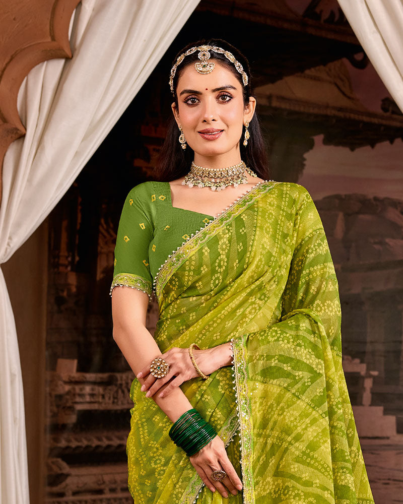 Vishal Prints Mehandi Green Traditional Print Brasso Saree With Fancy Embroidery Border