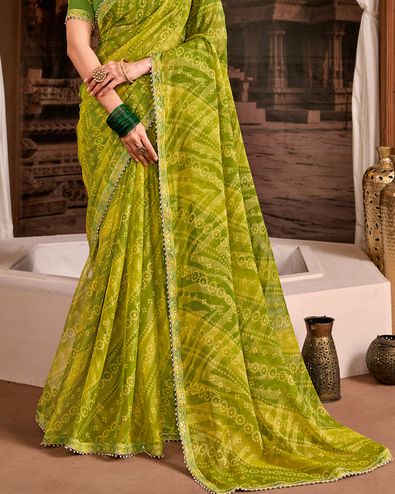 Vishal Prints Mehandi Green Traditional Print Brasso Saree With Fancy Embroidery Border