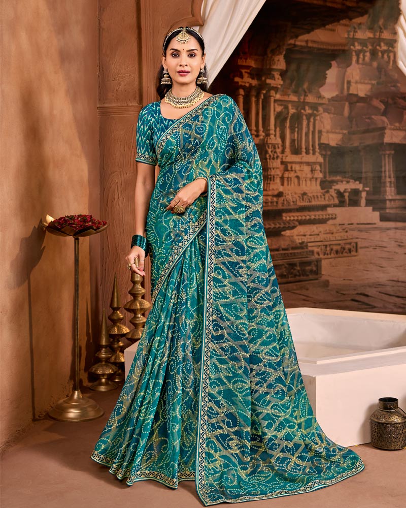 Vishal Prints Mor Blue Traditional Print Brasso Saree With Fancy Embroidery Border