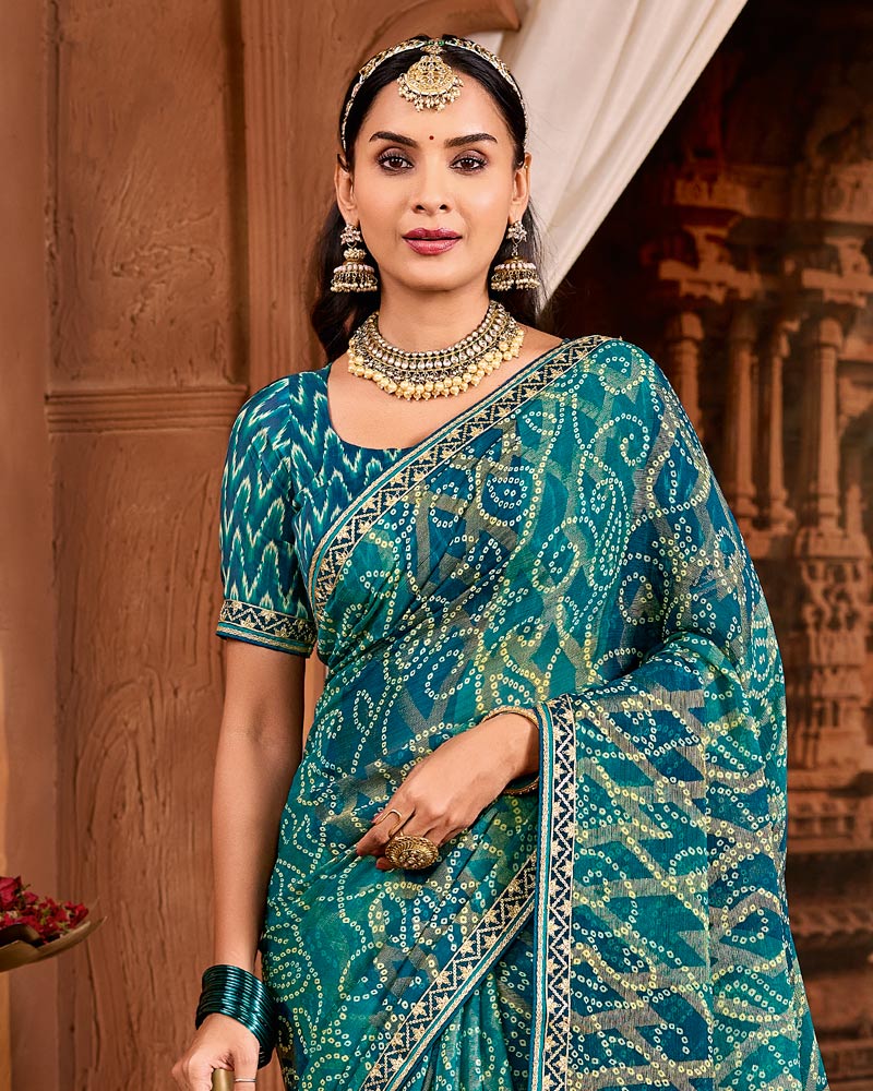 Vishal Prints Mor Blue Traditional Print Brasso Saree With Fancy Embroidery Border