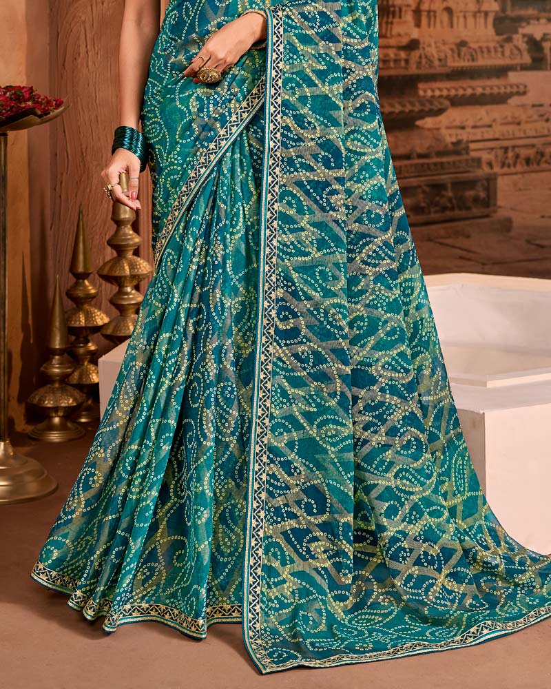Vishal Prints Mor Blue Traditional Print Brasso Saree With Fancy Embroidery Border