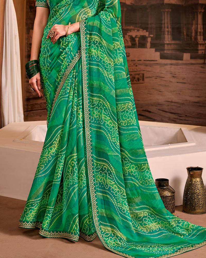 Vishal Prints Teal Green Traditional Print Brasso Saree With Fancy Embroidery Border