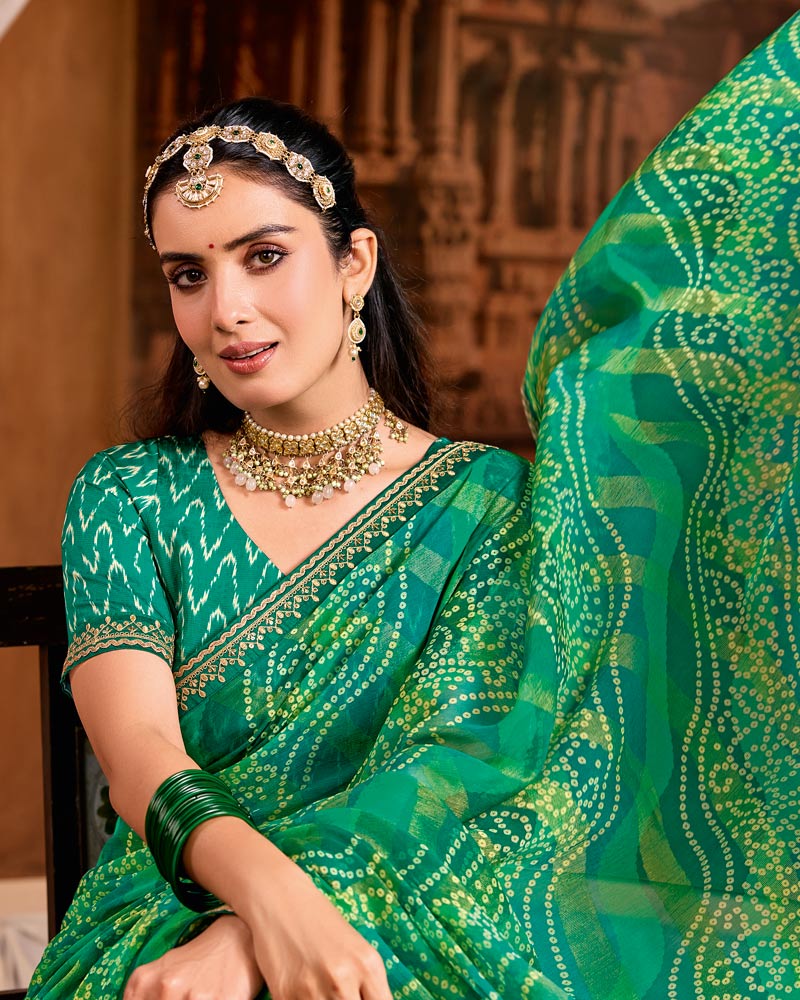 Vishal Prints Teal Green Traditional Print Brasso Saree With Fancy Embroidery Border