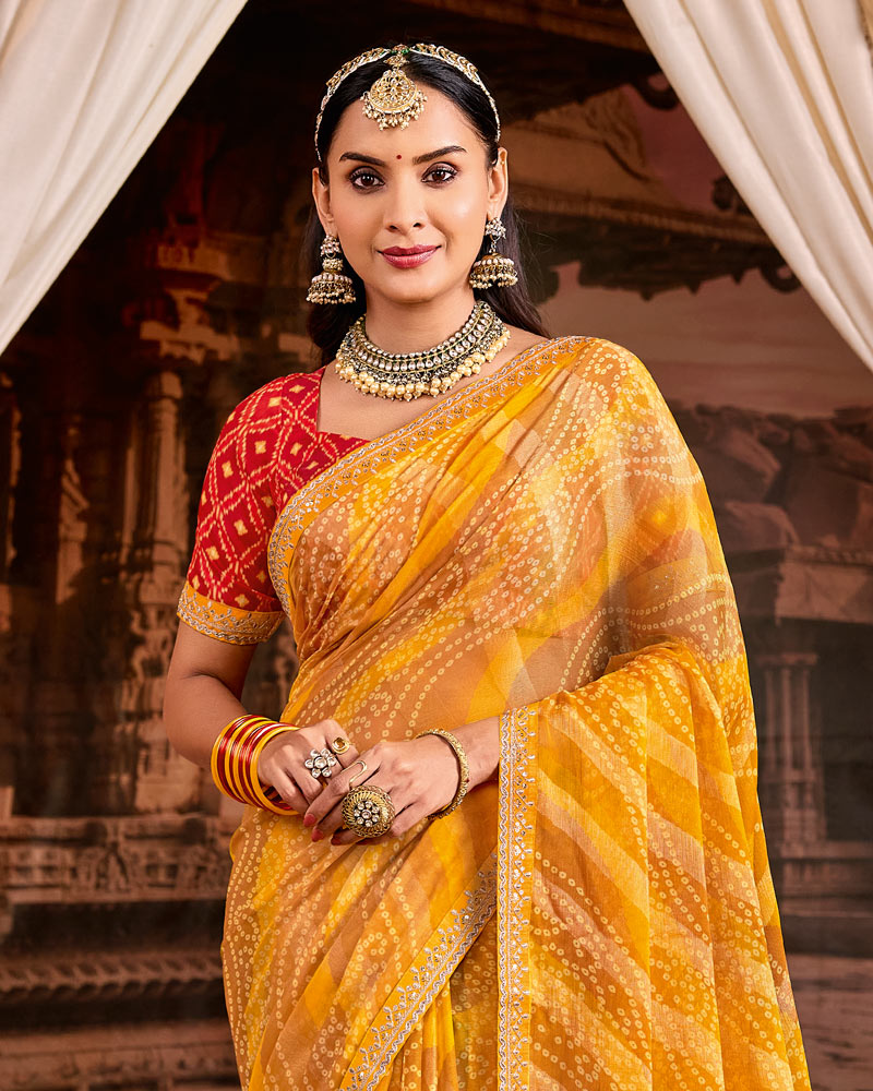 Vishal Prints Haldi Yellow Traditional Print Brasso Saree With Fancy Embroidery Border