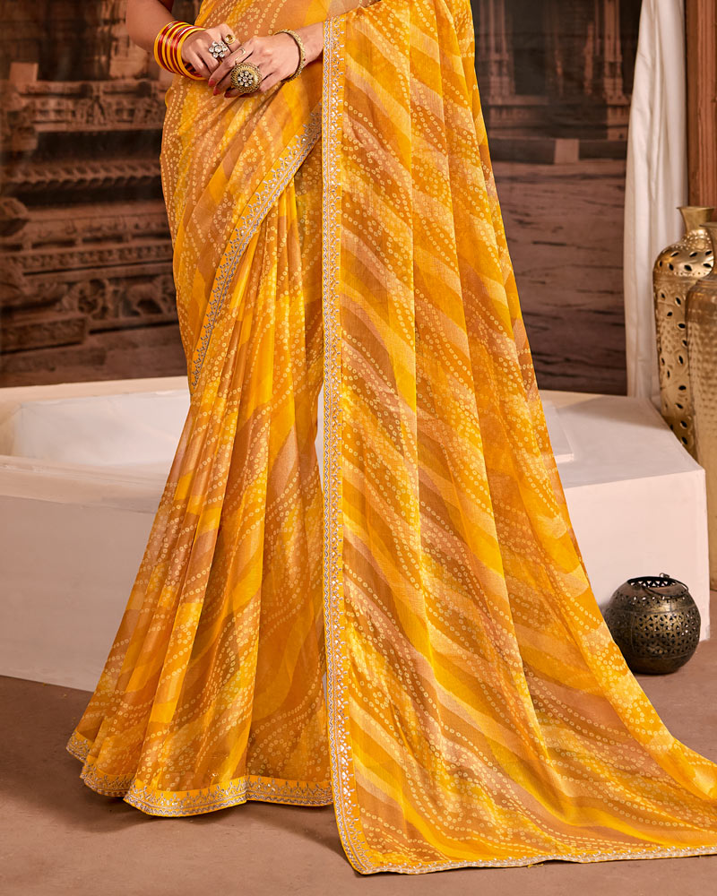 Vishal Prints Haldi Yellow Traditional Print Brasso Saree With Fancy Embroidery Border