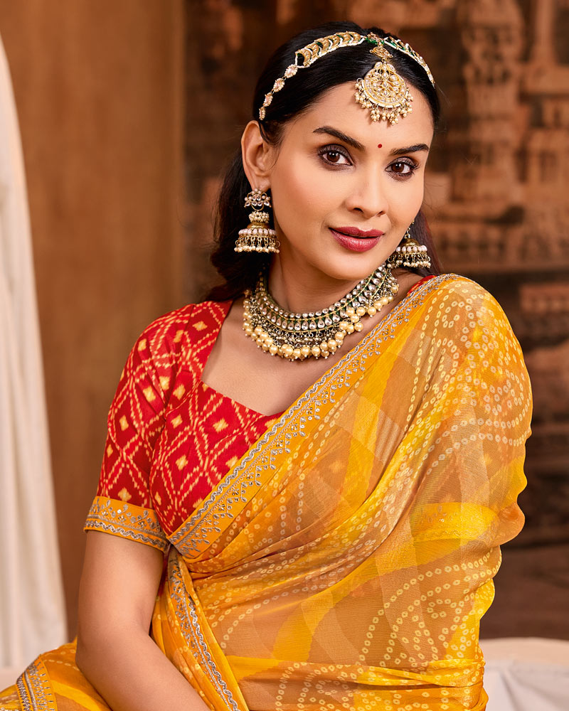 Vishal Prints Haldi Yellow Traditional Print Brasso Saree With Fancy Embroidery Border