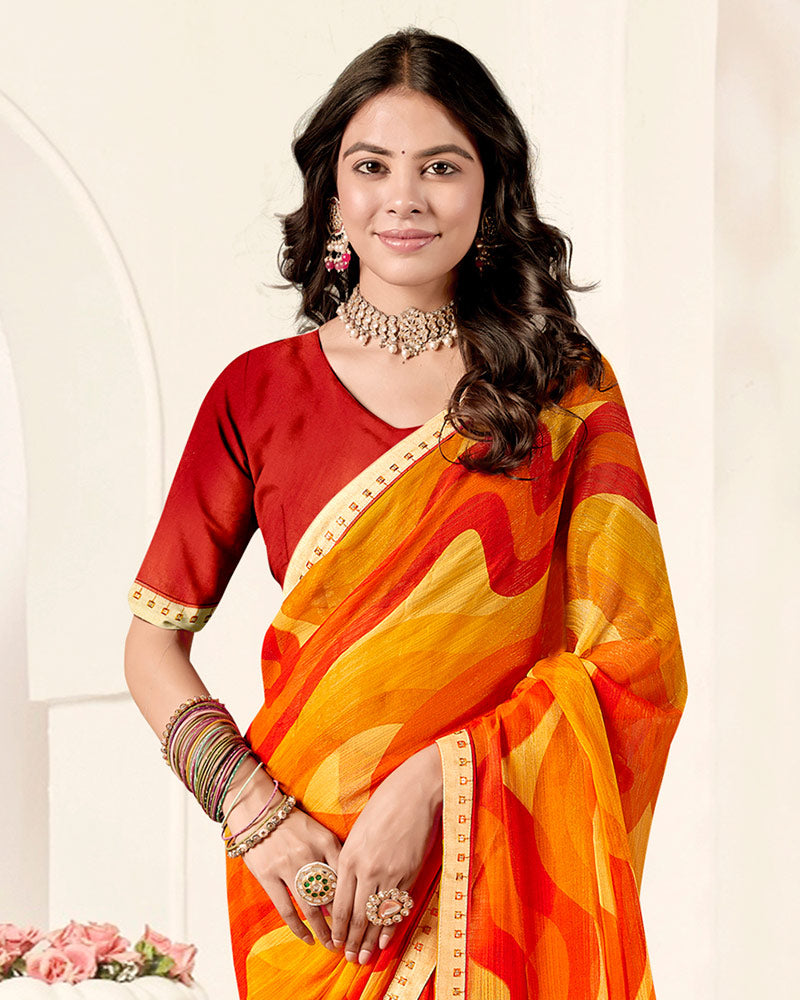 Vishal Prints Orangey Yellow Printed Fancy Chiffon Saree With Fancy Border