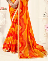 Vishal Prints Orangey Yellow Printed Fancy Chiffon Saree With Fancy Border