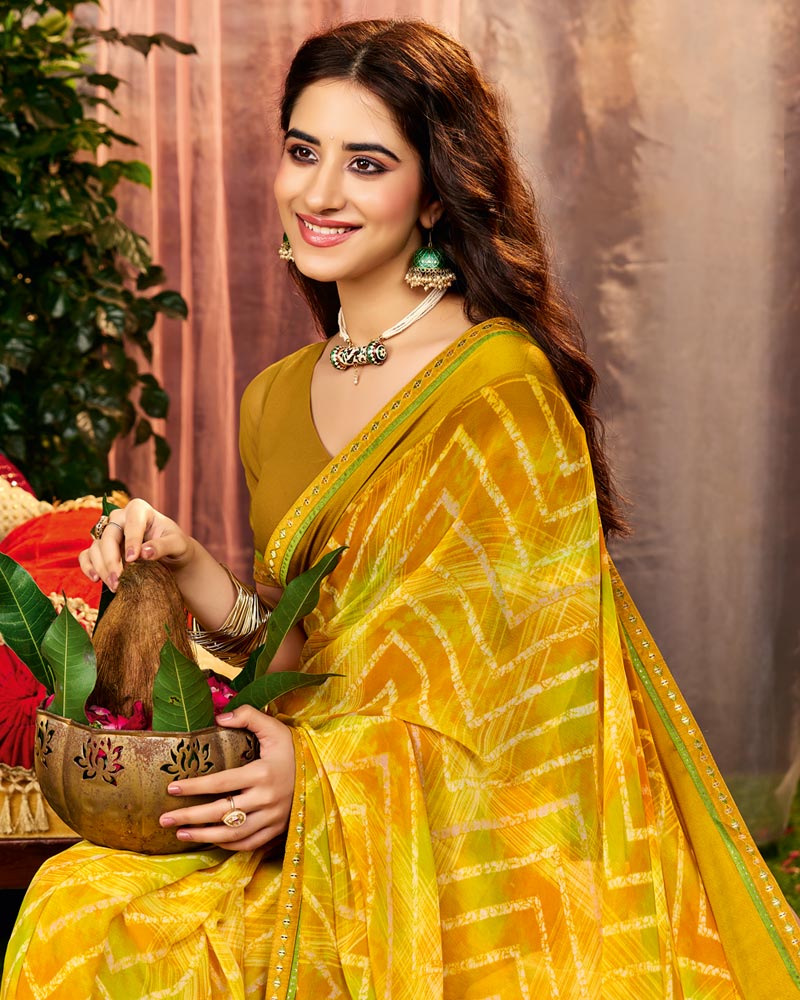 Vishal Prints Pheeni Yellow Printed Georgette Saree With Weaved Satin Patta And Fancy Border