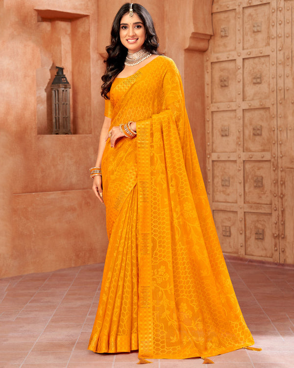 Vishal Prints Saffron Colour Designer Brasso Saree With Weaved Satin Patta And Diamond Work