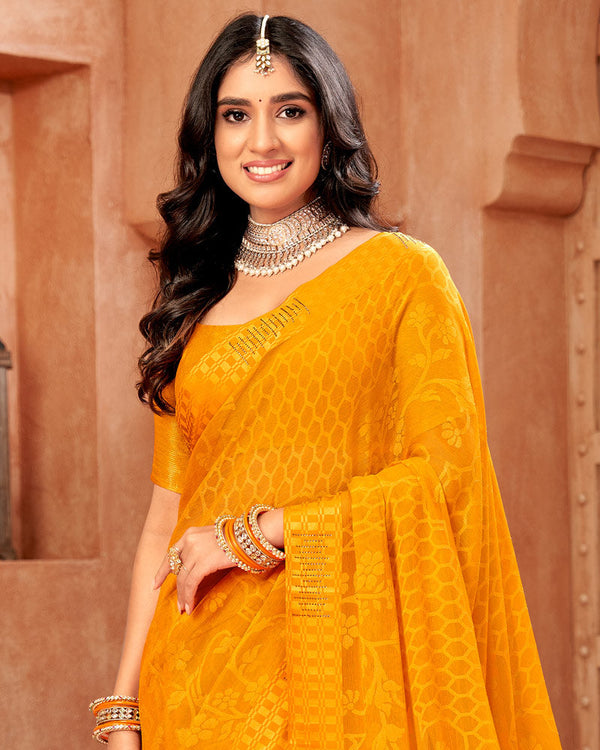 Vishal Prints Saffron Colour Designer Brasso Saree With Weaved Satin Patta And Diamond Work