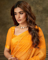 Vishal Prints Saffron Color Designer Brasso Saree With Weaved Satin Patta And Diamond Work